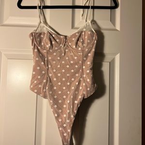 White fox polka dot body suit!